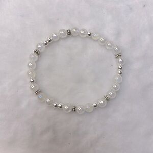 21.  Size 7 or smaller. Crackle angel aura quartz